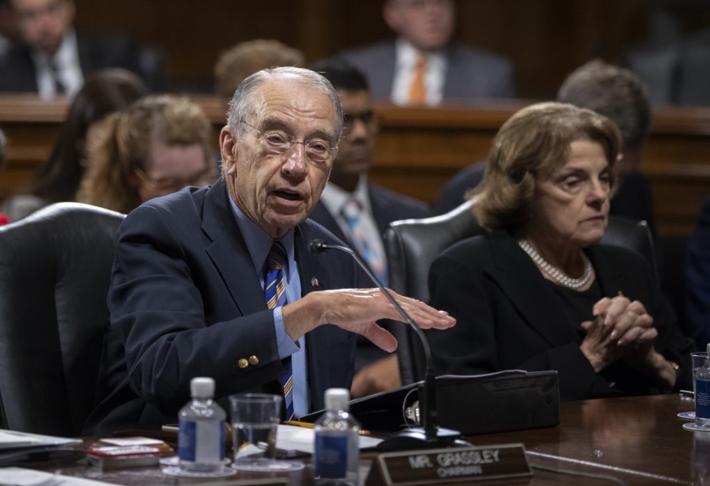 Senate Judiciary Committee Chairman Chuck Grassley, R-Iowa, joined at right by Sen. Dianne Feinstein, D-Calif., the ranking member, holds a markup session to vote on new federal judges, on Capitol Hill in Washington, Thursday, June 28, 2018. The Judiciary Committee oversees the confirmation process for presidential nominees to the Supreme Court. (AP Photo/J. Scott Applewhite)