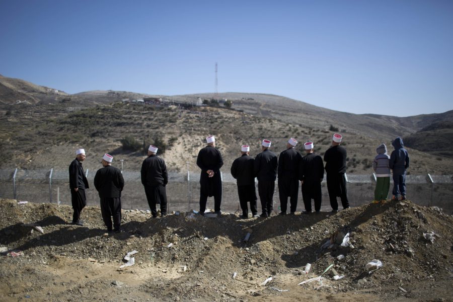 En grupp druser protesterar mot Israels ockupation av Golanhöjderna i februari 2014.