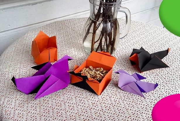 Hönor, en tulpan och en liten ask med nötter i origami.