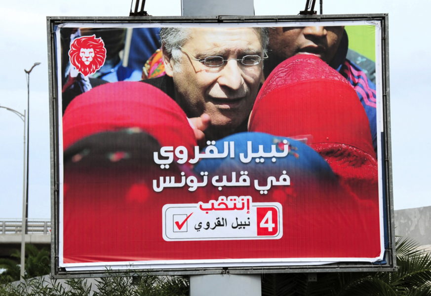 En valaffisch för den häktade presidentkandidaten Nabil Karoui.