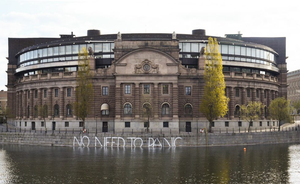 Klimataktion mot riksdagshuset i Stockholm.
