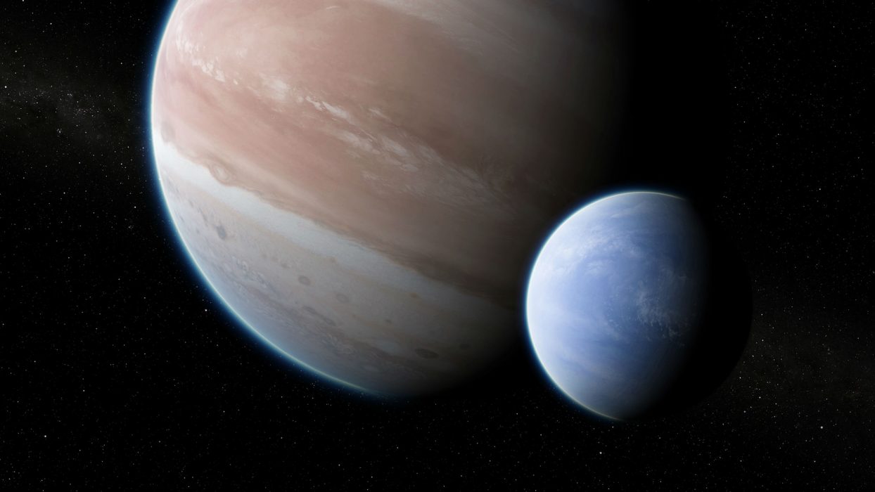 Illustration av exoplaneten Kepler-1625b, och dess möjliga måne.