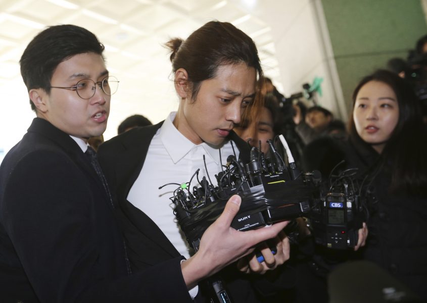 K-popartistenJung Joon-young anländer till polisförhör i Seul i mars.