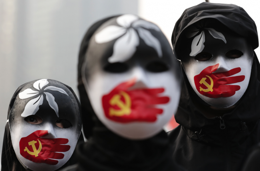 Protester i Hongkong mot hur Peking behandlar uigurer i Kina.
