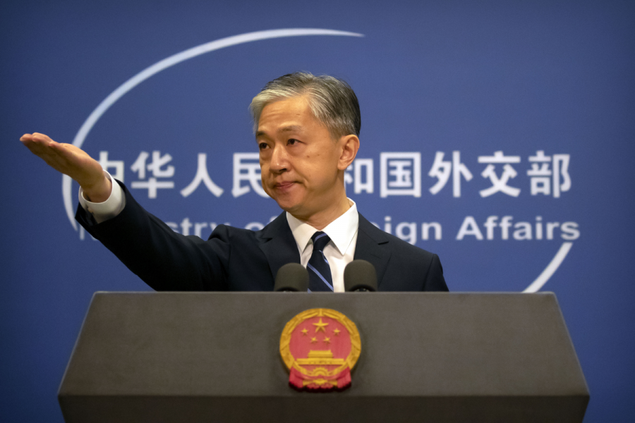 Wang Wenbin, talesperson för Kinas utrikesdepartement, under en pressträff i juli.