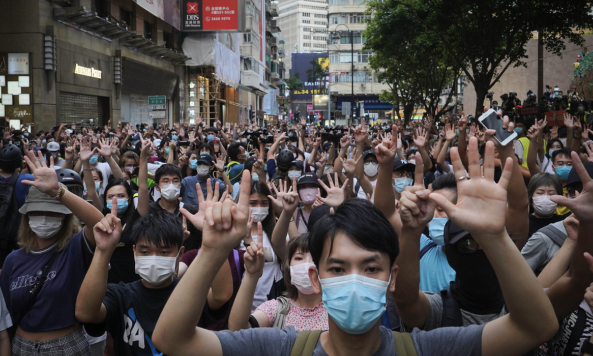 Demonstrationer mot de nya säkerhetslagarna i Hongkong den 1 juli iår.