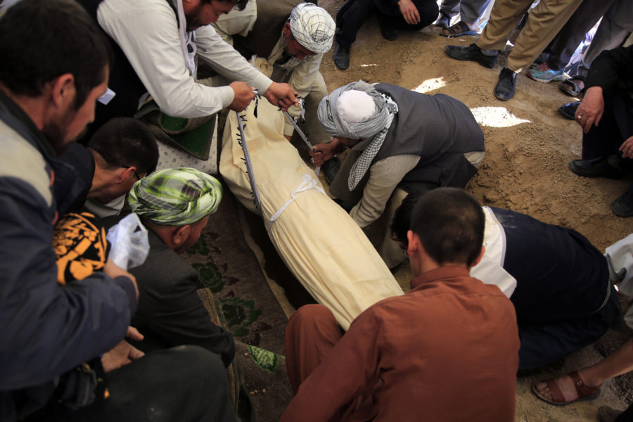 Ett offer för lördagens attack mot en afghansk flickskola begravs i Kabul.