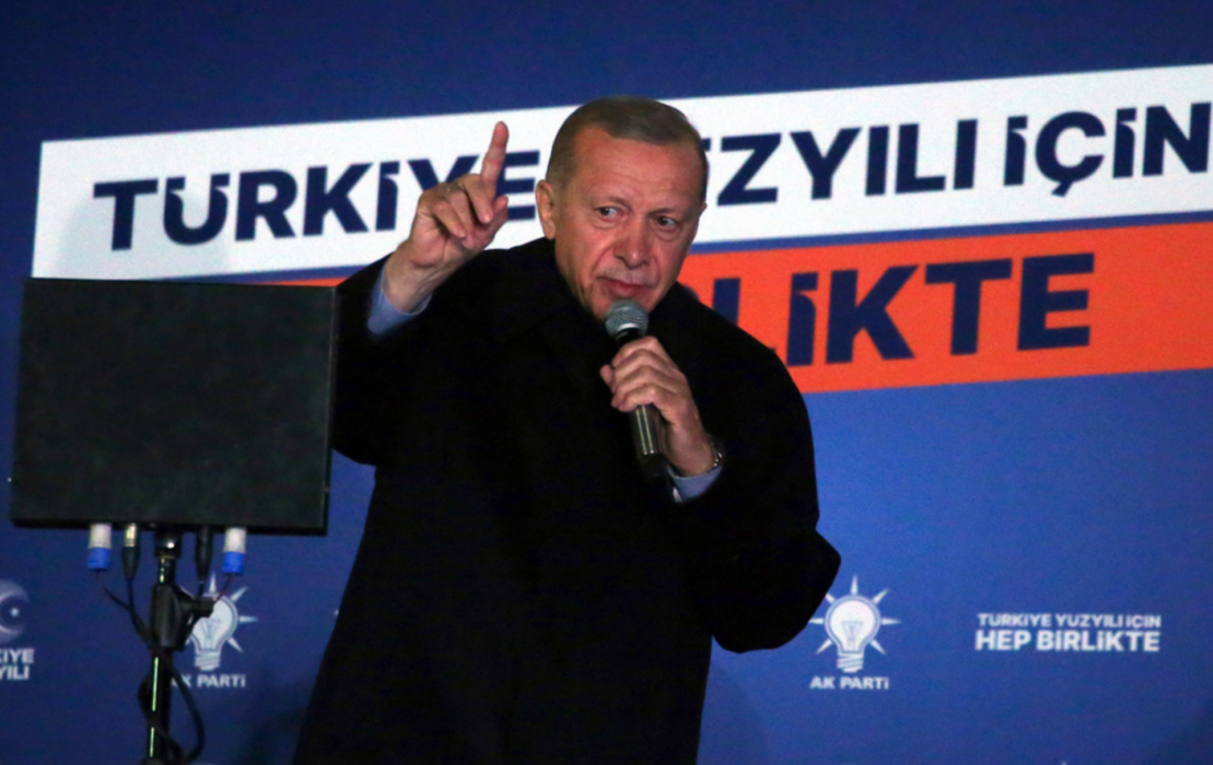 Turkiets sittande president Recep Tayyip Erdogan var segerviss under sitt nattliga tal Ankara.