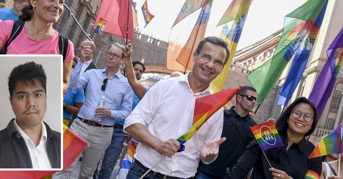 Ulf Kristersson och Tobias Billström i Prideparaden den 5 augusti i år.