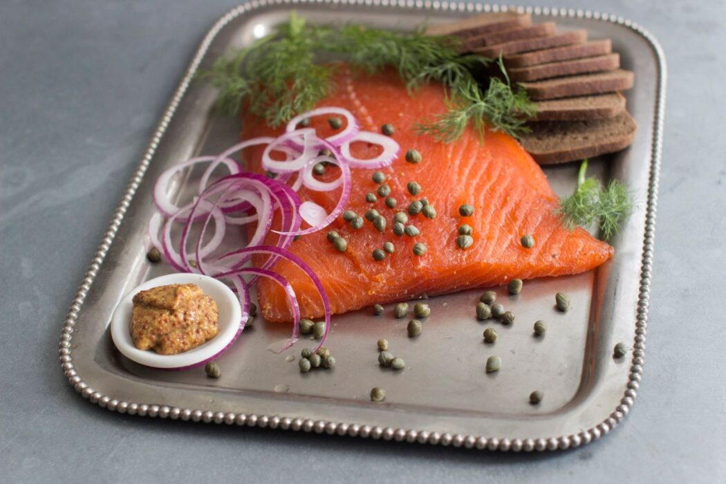 Listeria från en laxfabrik tros ligga bakom att sju personer avled under 2022, men som missades av myndigheterna.