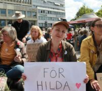Aktivist i samband med en manifestation i Malmö