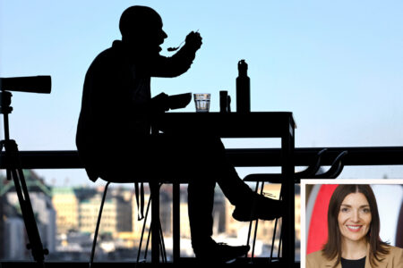 Silhuett av man som äter lunch