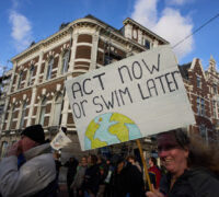 Tens of thousands of people demonstrate calling for tougher action against climate change just days before the Oct. 29 general election in the Netherlands, in The Hague, Netherlands, Sunday, Oct. 26, 2025. (AP Photo/Peter Dejong) PDJ110