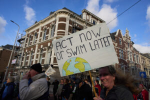 Tens of thousands of people demonstrate calling for tougher action against climate change just days before the Oct. 29 general election in the Netherlands, in The Hague, Netherlands, Sunday, Oct. 26, 2025. (AP Photo/Peter Dejong) PDJ110